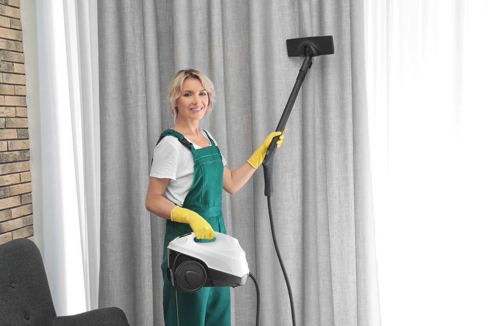 cleaning full wall curtains in Dubai home