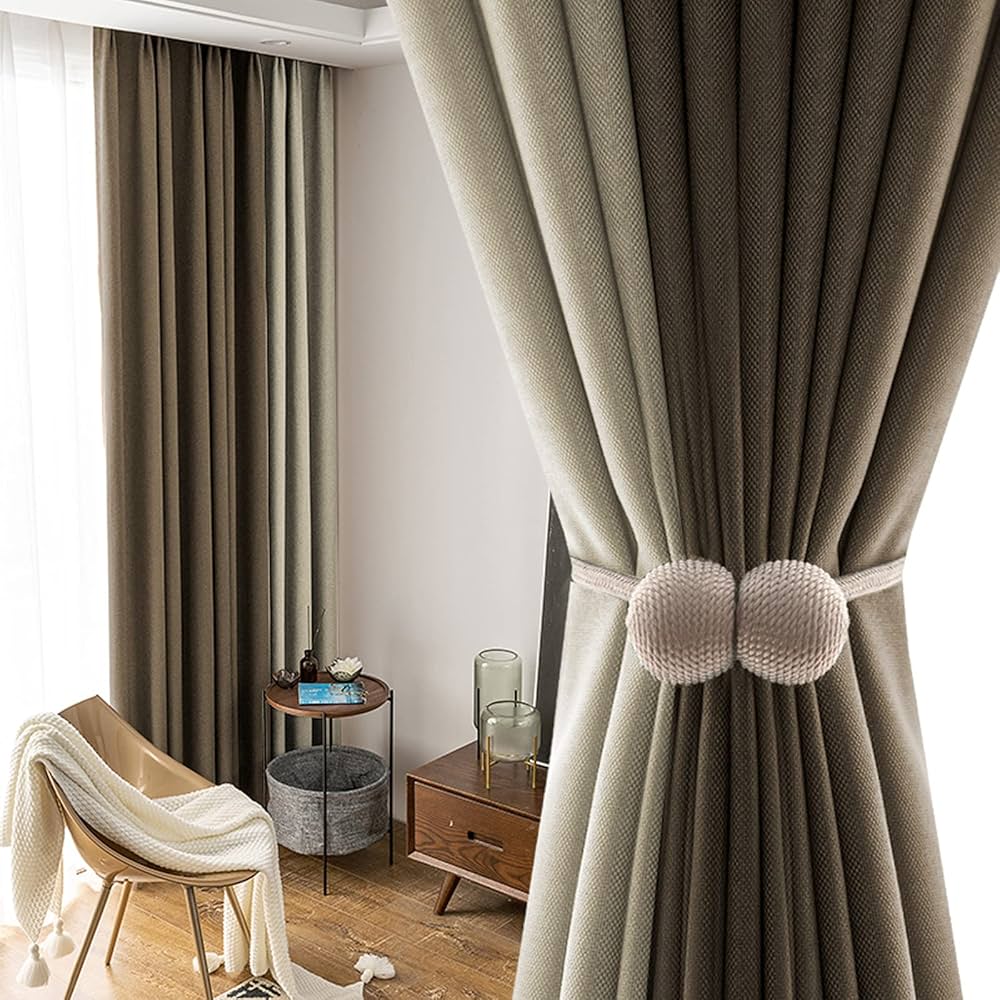 Modern Soundproof Curtains in Dubai creating a peaceful and stylish living room atmosphere.