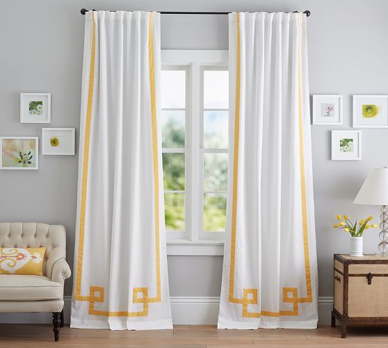 A bright Dubai living room featuring soft cotton curtains flowing beside large windows. The space reflects comfort, breathability, and elegant simplicity — perfect for anyone learning how to choose the right curtain fabric in Dubai. The natural texture of cotton creates a cozy, welcoming feel ideal for both modern and traditional interiors.